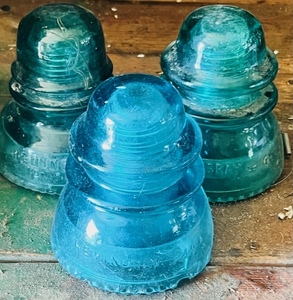 lot 12 image: Three Hemingray Glass Insolators- 1 Blue &amp 2 Green