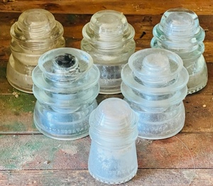 lot 15 image: Six Assorted Hemingray Glass Insolators