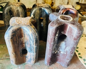 lot 17 image: Five Vintage X Shaped Brown Porcelain insulators