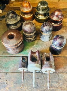 lot 23 image: Eleven Assorted Brown Porcelain Insulators