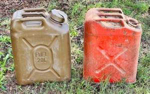 lot 40 image: Two Vintage 20L Gas Cans ( One USMC 1983One Made by Scepter for the US Government)