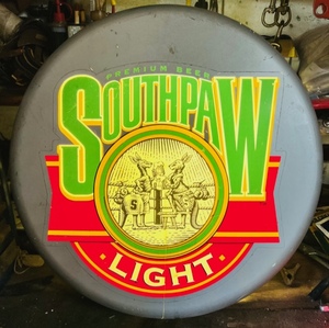 lot 65 image: 18 Southpaw Light Premium Beer Light Up Bottle Cap Advertising- Works