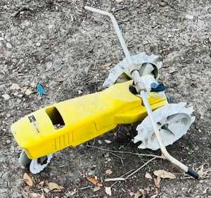 lot 183 image: Vintage Yellow &amp White Cast Iron Sears Craftsman Traveling Lawn Sprinkler Tractor