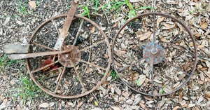 lot 199 image: Two Antique Wheel Barrow Metal Wheels