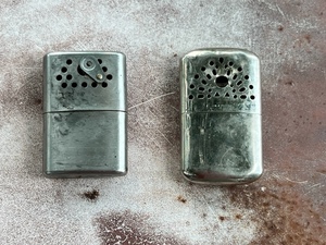 lot 203 image: Two Vintage Metal Hand Warmers- Jon-E Aladdin &amp Unbranded