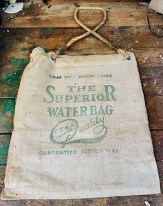 lot 266 image: AntiqueVintage C.T.&ampA. Scotch Flax The Superior Water Bag Used By The State Highway Department&nbsp