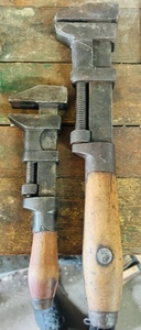 lot 319 image: Antique Coes 15 Monkey Wrench & Antique P. S. & W. Co. Stronghold Wood Handle Pipe Wrench