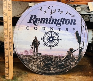 lot 357 image: Remington Country Metal Advertising Sign