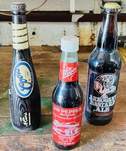 lot 379 image: Vintage Collectors Edition Coors Baseball Bat Bottle, Dr Pepper Museum 10th Anniversary 2001 Collectible Bottle, & Arrogant Bastard Ale Bottle - All Unopened