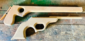 lot 401 image: Two Vintage Rubber Band Pistols