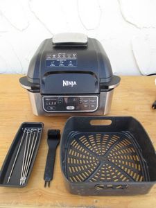 lot 4 image: THE INCREDIBLE, WORKING, NINJA FOODI GRILL, 5-IN-ONE COOKING CAPABILITIES, CAN BE USED TO GRILL, AIR FRY, DEHYDRATE, ROAST & BAKE
