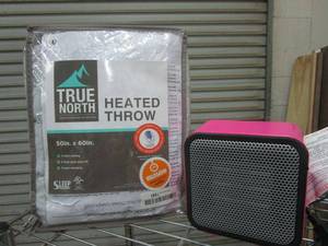 lot 119 image: WORKING TRUE NORH HEATED THROW, AMAZONBASICS PINK DESKTOP INDOOR HEATER