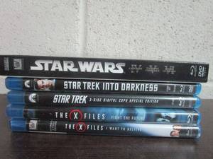lot 97 image: BLU-RAY LOT, STAR WARS IV, V & VI BOX SET, STAR TREK, STAR TREK INTO DARKNES, THE X FILES FIGHT THE FUTURE & I WANT TO BELIEVE