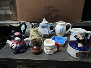 lot 63 image: BRITISH NAVY PUSSERS RUM BOTTLE, COW CREAMER JAR, CHINA