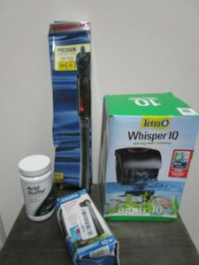 lot 179 image: FISH TANKAQUARIUM LOT, TETRA WHISPER IQ 10 GALLONS, MARINELAND PRECISION SUBMERSIBLE HEATER, MARINA SUBMERSIBLE AQUARIUM HEATER, ACID BUFFER