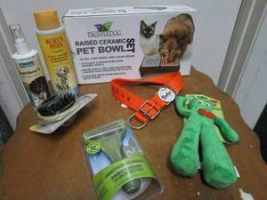 lot 34 image: PET LOT, RAISED CERAMIC PET BOWL SET, BURTS BEES 2-IN-1 SHAMPOO & CONDITIONER, SEPTIDERM-V LOTION, GUMBY SQUEEK TOY, BULLYS DOG COLLAR, LONG HAIR PET BRUSH, BOAR BRISTLE BRUSH
