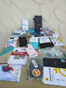 lot 54 image: GENEROUS PHONE ACCESSORIES LOT, SCREEN ASSEMBLY REPAIR TOOLKIT, CHARGING CASES, SCREEN PROTECTORS, CHARGERS, OTTER BOX, WATERPROOF CASES