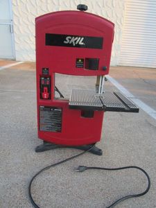 lot 212 image: SKIL 2 SPEED BAND SAW W WORK LIGHT, EXTRA BLADES, WORKING