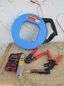 lot 224 image: VOLT GUARD 120 NON-CONDUCTIVE FISH TAPE, NON-CONTACT AC VOLTAGE DETECTOR, MULTIMETER, TONE PROBE FOR LVPRO SERIES, IDC CONNECTORS CRIMPING TOOL, IWISS SN-28B CRIMPING TOOL