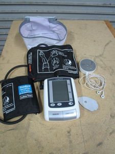 lot 241 image: CARE ONE PORTABLE BLOOD PRESSURE MACHINE, OMRON ELECTROTHERAPY DEVICE