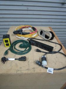 lot 255 image: EXTENSION CORDS & PLUGS