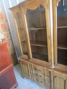 lot 2 image: Thomasville 2 piece hutch, bottom side storage and 3 center drawers Light brown  72 X 50 X 16