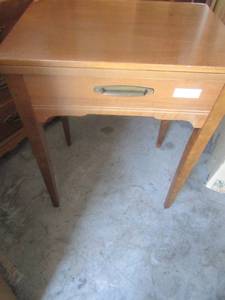 lot 61 image: Sewing table with insert, (sewing machine not included) 30 by 23 12 by 17 12 open 46 12 width