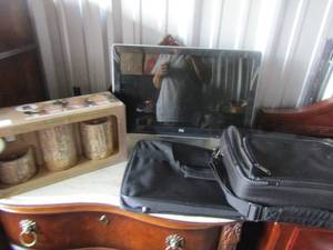 lot 71 image: HP desktop computer unknown working condition, 2 computer bags    new 3 piece flameless candles