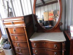 lot 1 image: Vintage Side by Side Chest with Oval mirror Lower side has marble top, 9 drawers total, Lion head pull rings - 54Wx59Hx19D