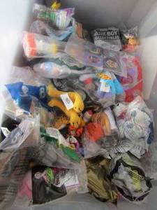 lot 77 image: Clear tote of various happy meal toys from McDonalds, Wendys, Jack in the box and more�..
