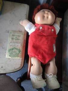 lot 80 image: CABBAGE PATCH DOLL  name is Benjerman Vick comes with birth certificate