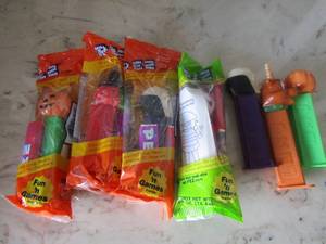 lot 81 image: PEZ DISPENSERS    NIP &  used