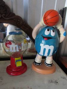 lot 53 image: M&M candy dispenser - 9 and a basketball blue M&M player 13