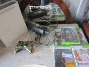 lot 30 image: X BOX 360 game console with power plug and comes with 5 games 1 controller 1 headset