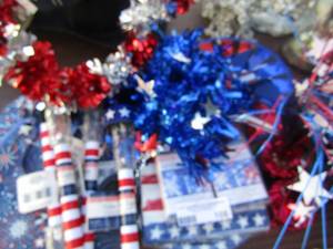 lot 108 image: 4th of july lot new items, flip flops size 8, paper plates , napkins, yard dcor lights and more