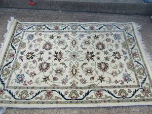 lot 117 image: 2 cream color rugs, lg area rug 6097- small area rug 7042 14
