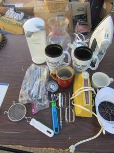 lot 120 image: Black and decker can opener, iron, wisk, apple peeler, silverware and more