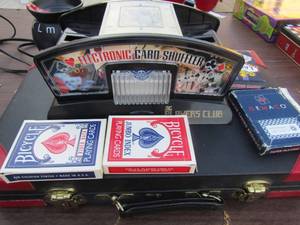 lot 123 image: Game lot, electric card shuffler, cards , backgammon game in case