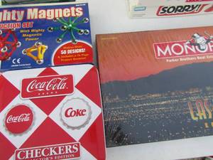 lot 128 image: Game lot,- Monopoly Las Vegas edition, mighty magnets, coca cola checkers edition