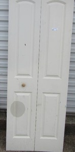 lot 143 image: Folding closet door white in color, 79 12  29 14