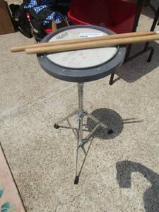 lot 150 image: Remo practice DRUM Pad, 2 drum sticks