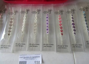 lot 158 image: Island treasures floral ankle braclets, pink purplewhite