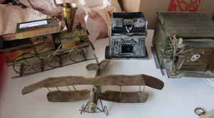 lot 160 image: METAL STRUCTURES - musical fireplace, metal train, airplane, barn