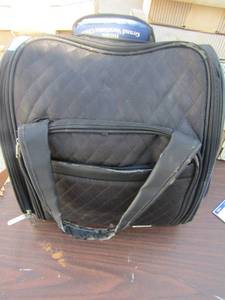 lot 213 image: Black carry on bag with wheels and handle