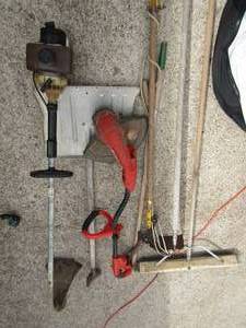 lot 246 image: Yard tools including 2 weedeaters, snow shovels, push broom and more