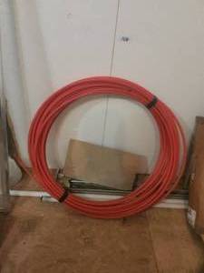 lot 106 image: Roll of 58 pex-type pipe