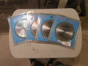 lot 126 image: Selection of unopened 4 combo blade - 7 14 - 24T C-2 tungsten Carbide tip saw blades