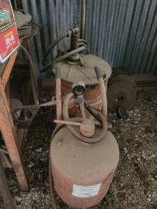 lot 224 image: Sand blaster and oil drum with pump