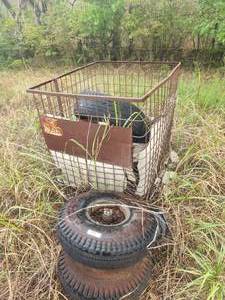 lot 331 image: Metal cage with tires, airplane running gear