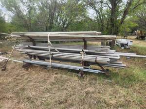 lot 372 image: Rack of various pipes, this wall stainless, etc.